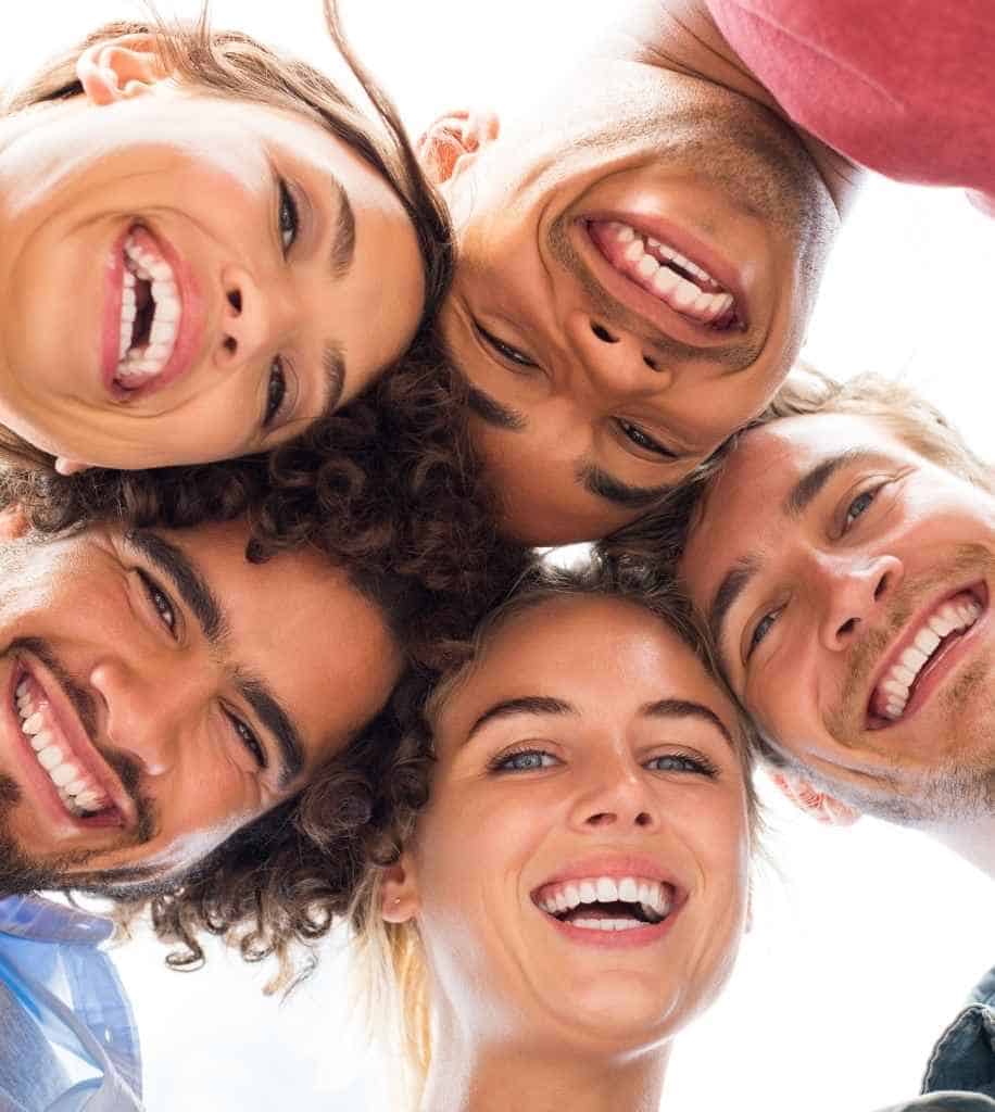 Smiling person showcasing white teeth after laser whitening treatment Wellingborough